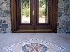 classic stone medallion, home entryway